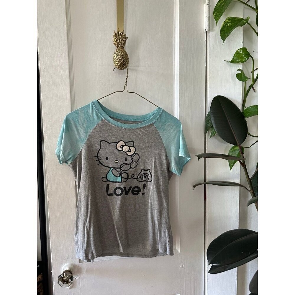 Hello Kitty women’s size small blue shirt
